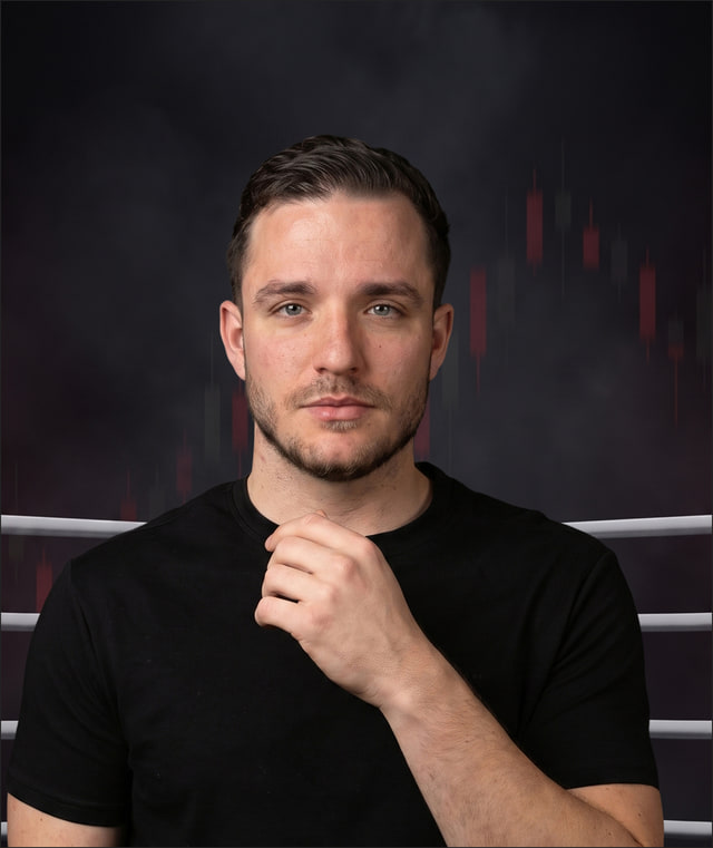 David Viota with a raised fist in a TFC ring